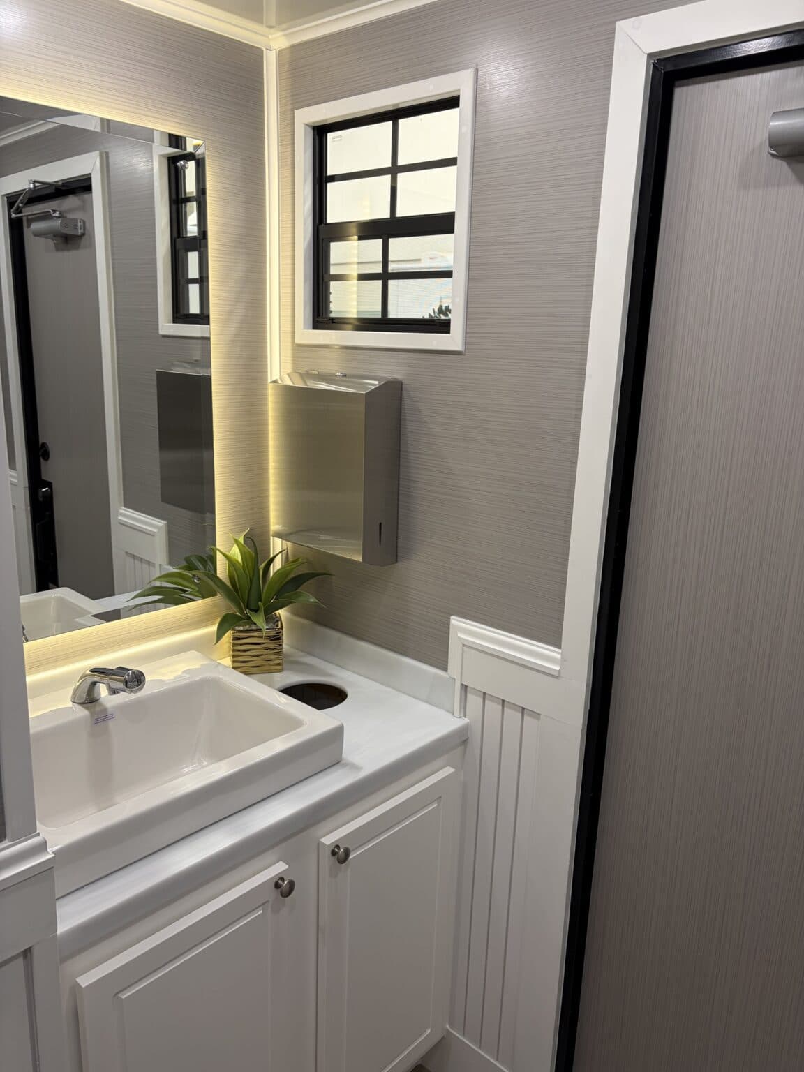 The Cottage vanity with backlit mirror